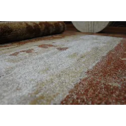 Tapis SHADOW 9368 doré et rouillé, idéal pour les chambres modernes