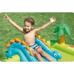 Idéal pour le jardin, terrain de jeu gonflable pour enfants avec des dinosaures